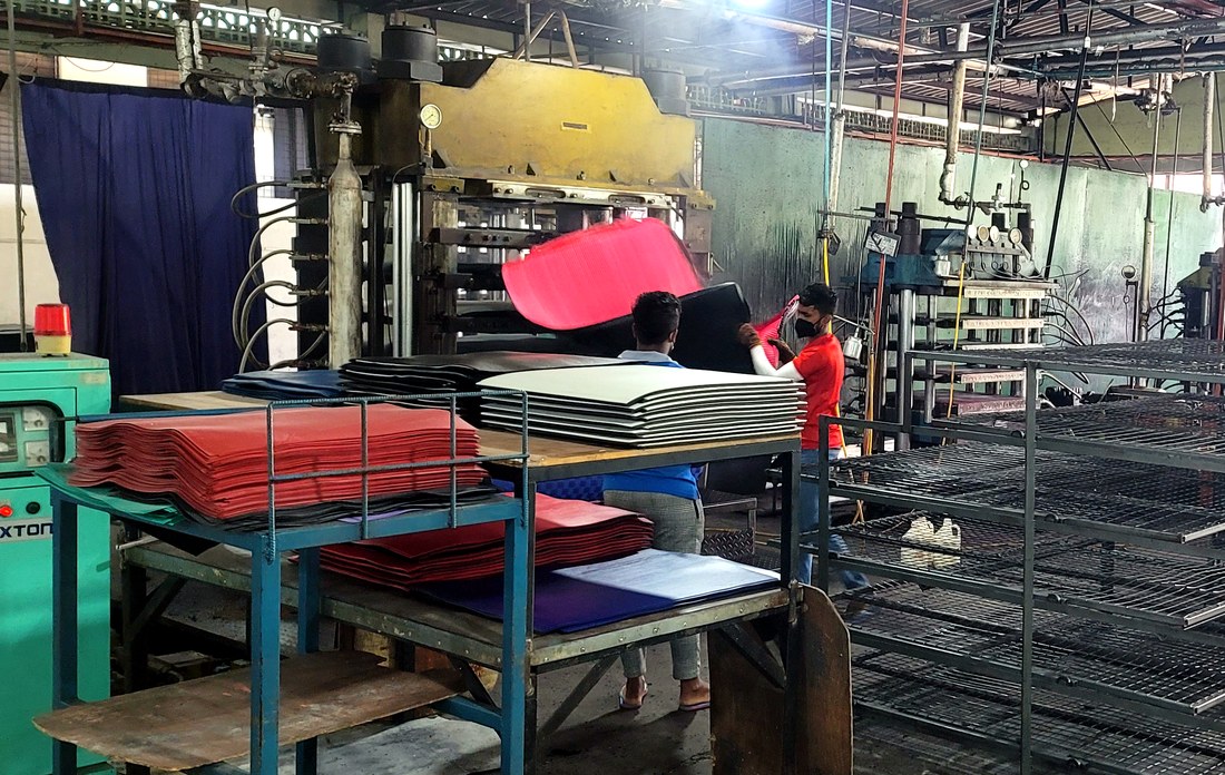 Press area with finished coloured EVA sheets