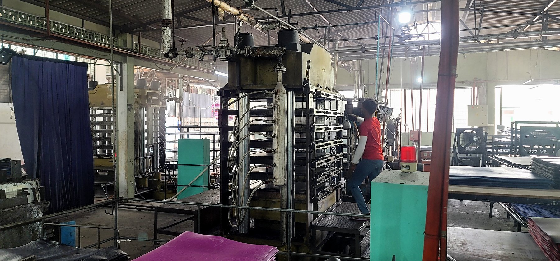EVA sheet press operating in a production plant