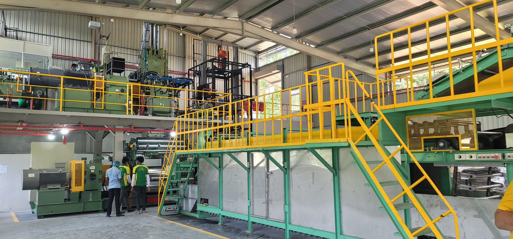 Compounding line installed: internal mixer on the upper deck feeding the mill and batch-off below