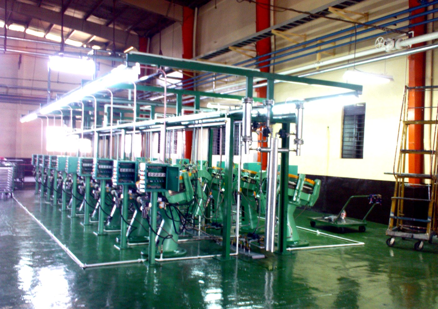 A row of inner-tube curing presses in production